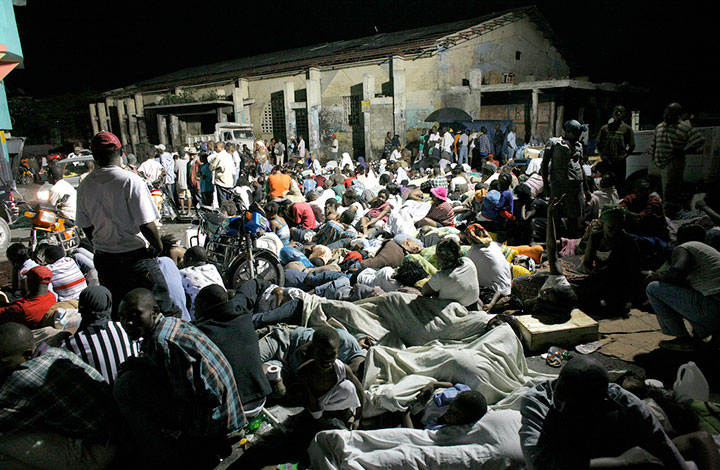 large crowd sleeping in the streets