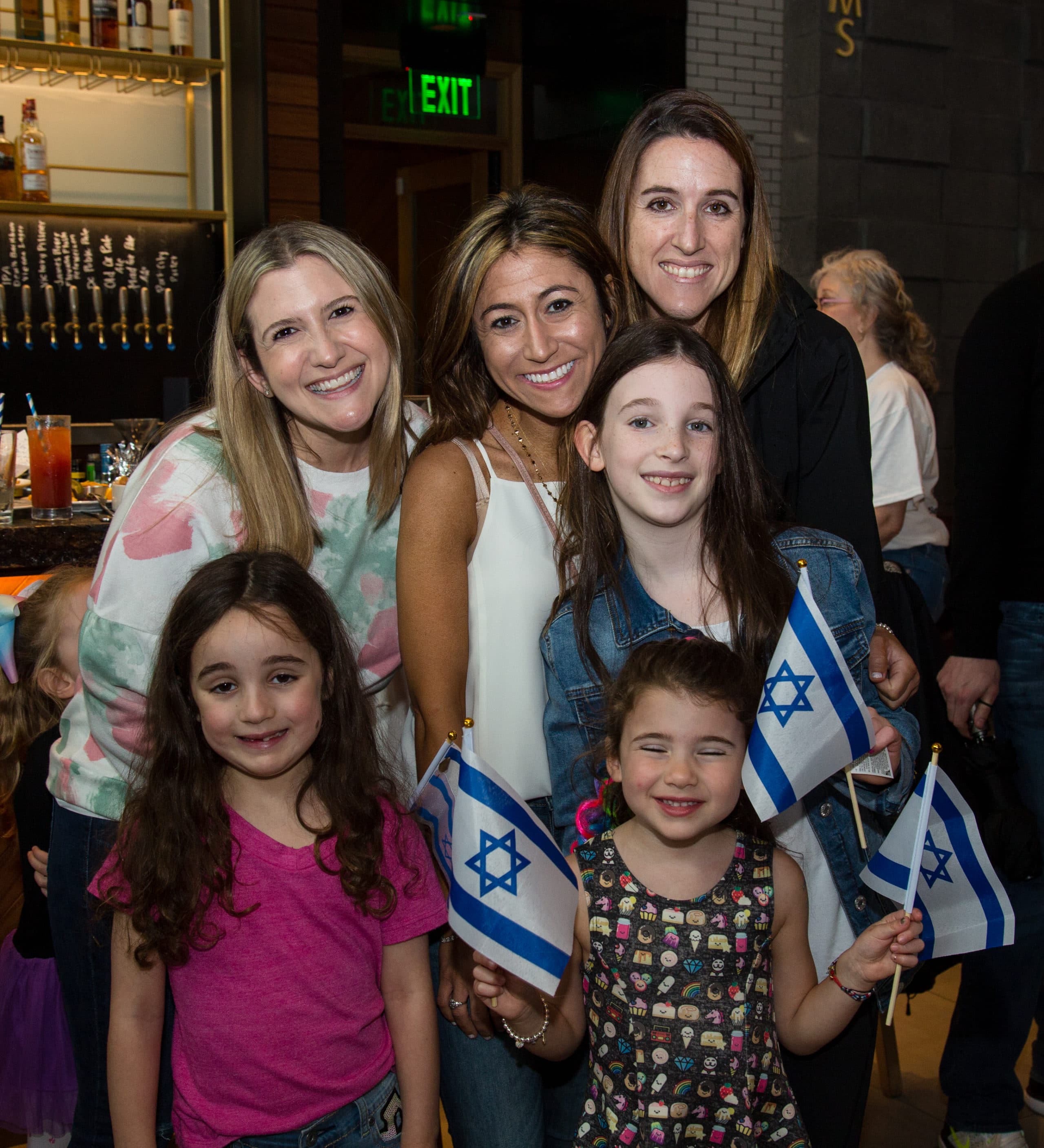 women and girls with Israeli flags