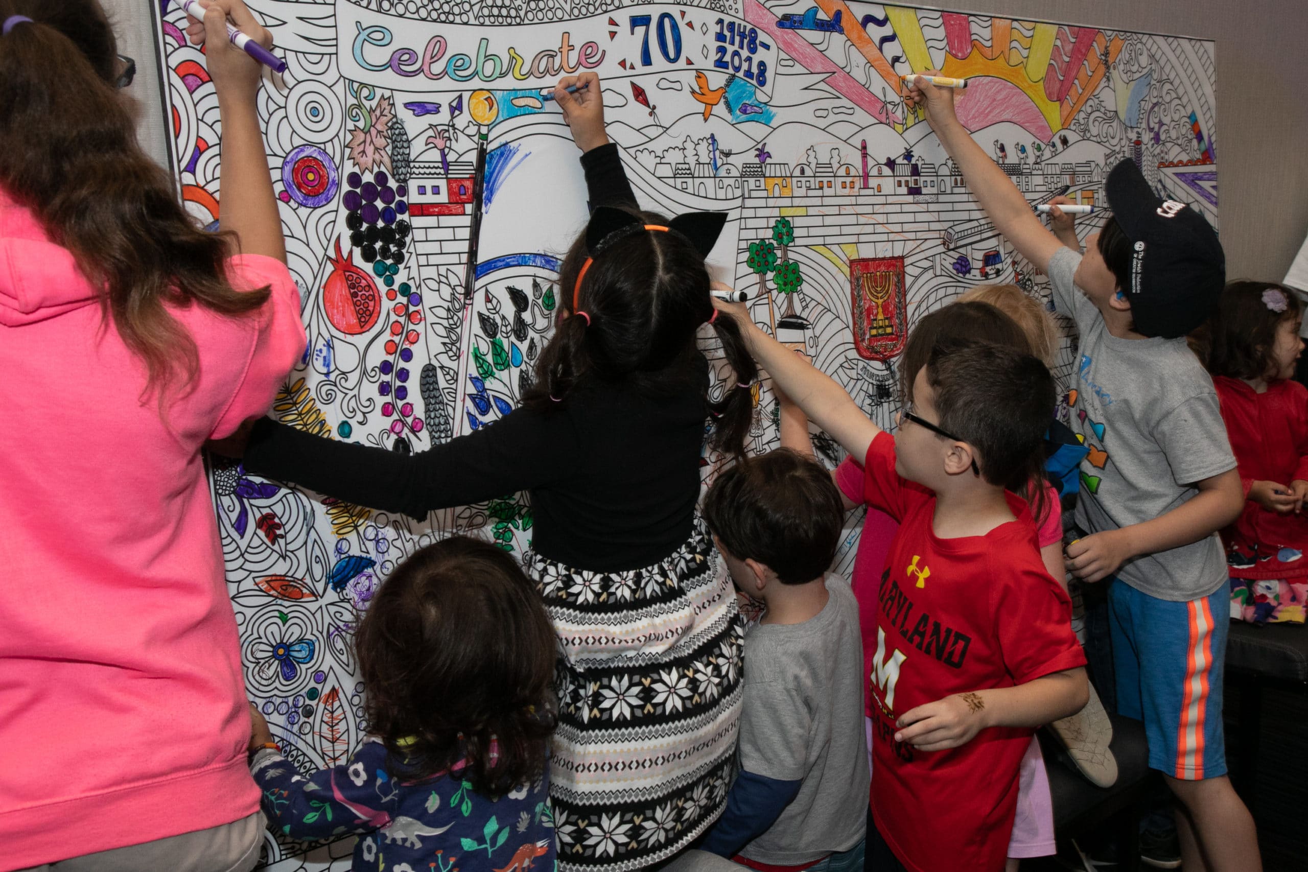 children coloring mural of Jerusalem