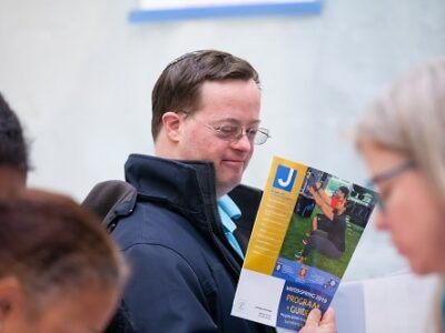 Man Reading Brochure_IMG_0304 Man Reading Brochure_IMG_0304