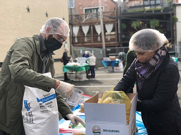 Volunteers packing food in DC