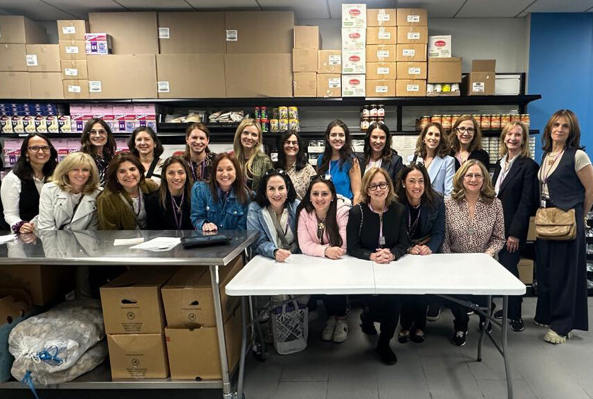 WP Ruby Lion NYC Trip 2025 Group in Food Pantry Kitchen