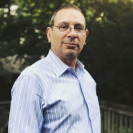 Headshot photo of Dr. Adam Bronstone