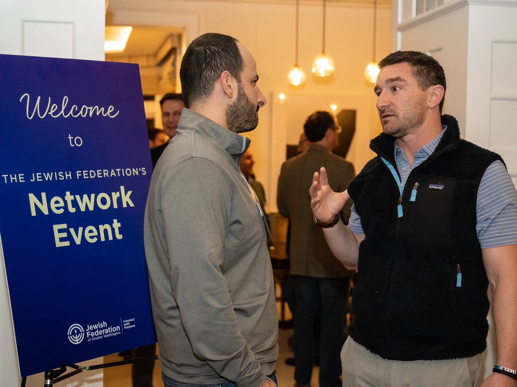 Two men in conversation at a Network Event