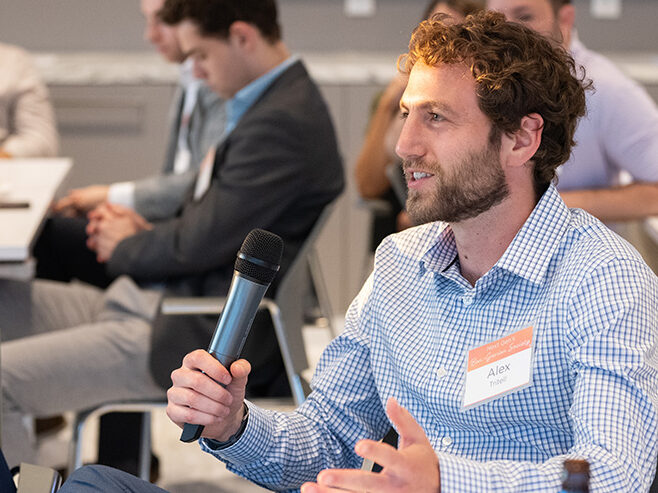 Man speaking at table, at a Ben Gurion Society event, in Spring 2025.