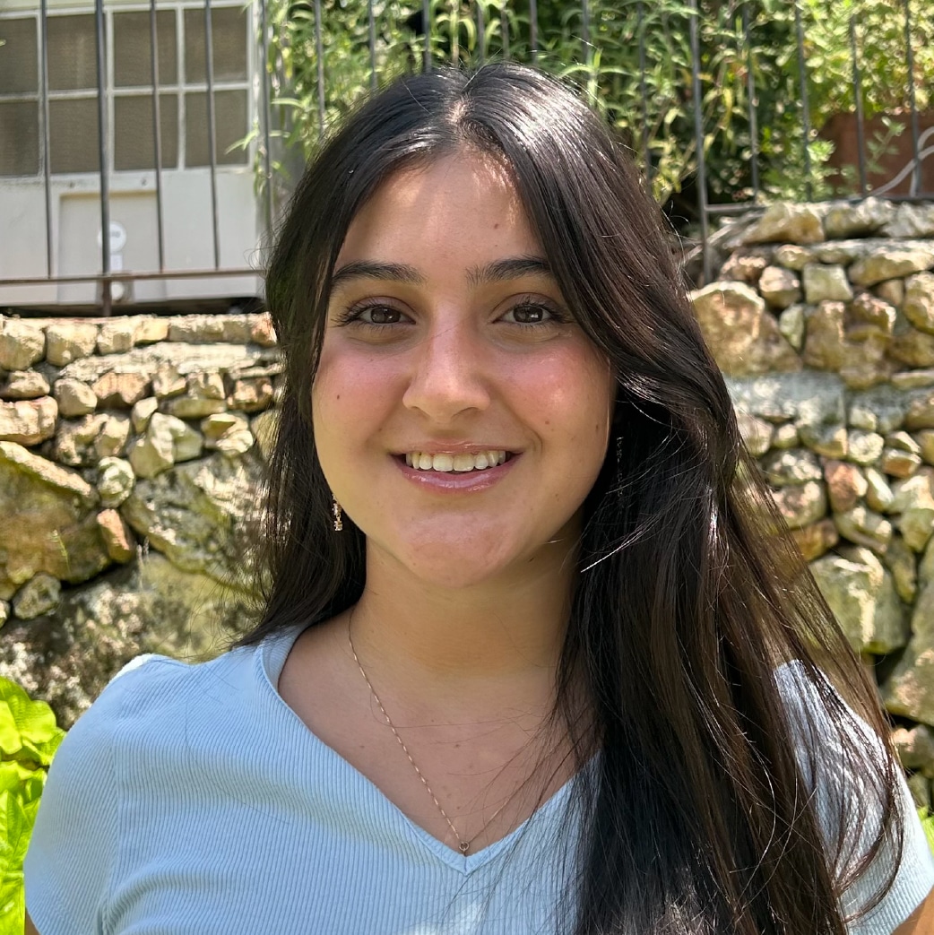 A headshot of a woman