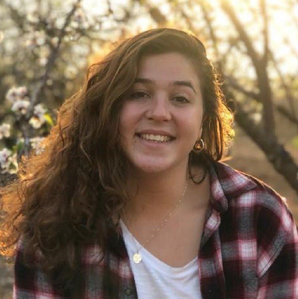 A headshot of a woman