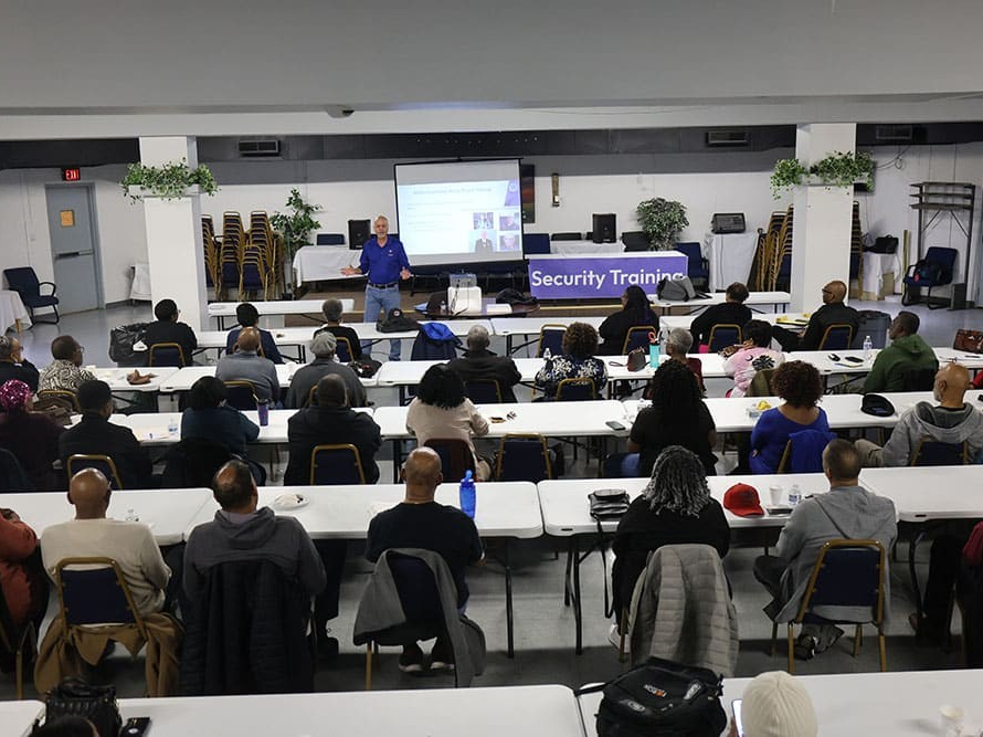 A-Large-Group-of-Professionals-Listening-to-a-Lecture-on-Security-Training