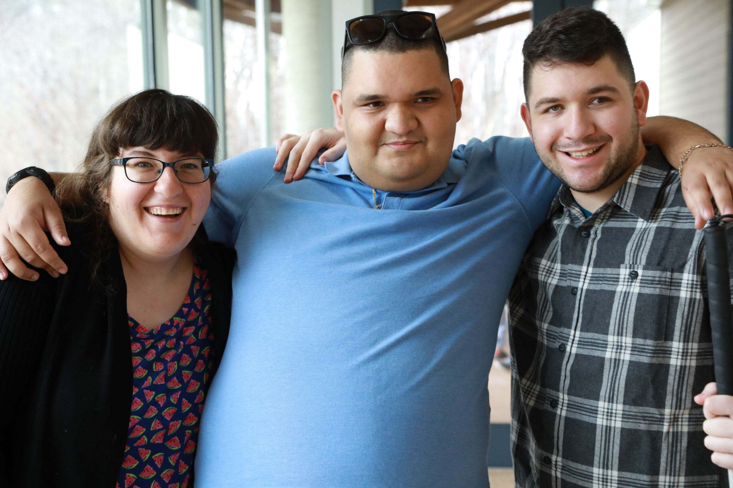 3 people smiling at Makom